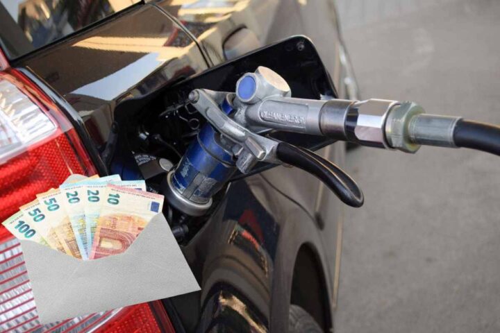 Un'auto a GPL in rifornimento e una busta con delle banconote