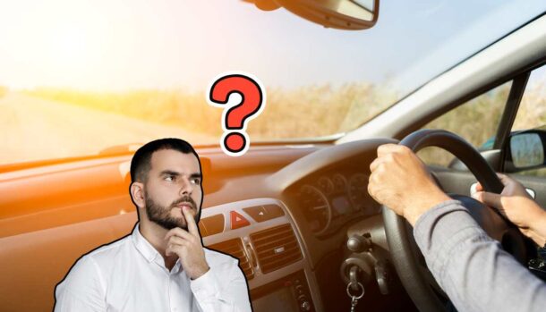 Auto con volante a destra e persona dubbiosa che si domanda il perché