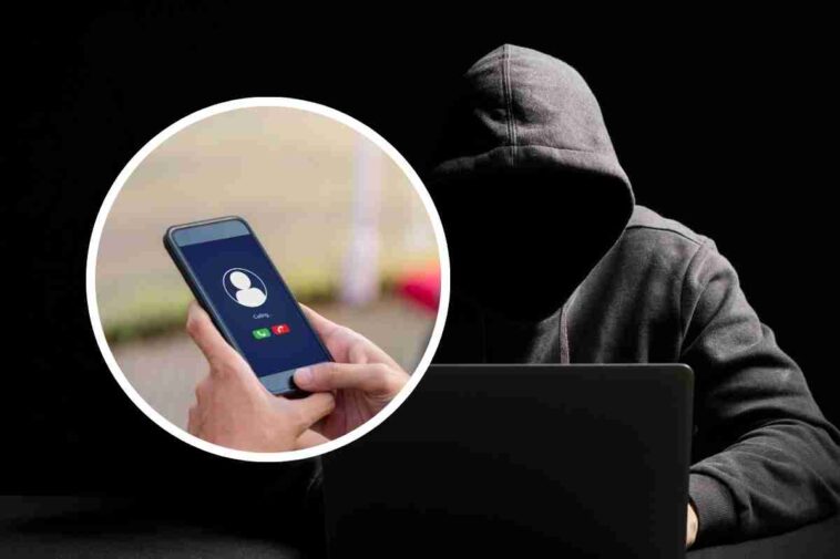 nel riquadro un telefono e dietro un uomo incappucciato